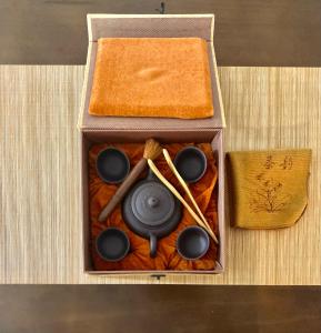 a wooden box with some items in it at Hanok Bomoon in Seoul