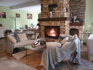 Khu vực ghế ngồi tại Poiana Golf Chalet