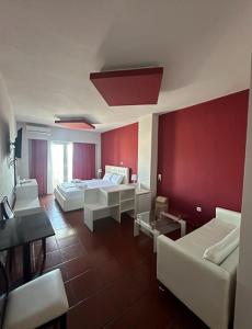 Voodi või voodid majutusasutuse Scala Hotel toas