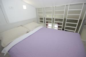 Posteľ alebo postele v izbe v ubytovaní Villa Lodrica
