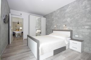 Posteľ alebo postele v izbe v ubytovaní Villa Lodrica