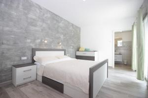 Posteľ alebo postele v izbe v ubytovaní Villa Lodrica + 37 fotografií