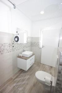 Kúpeľňa v ubytovaní Villa Lodrica