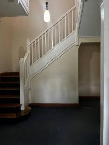 a staircase in a building with a stair case at KHAL HOST HUB in Nairobi