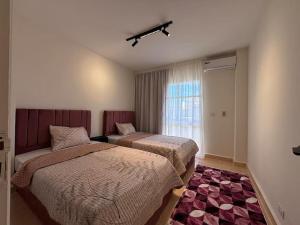 Postel nebo postele na pokoji v ubytování Dream Apartment in Cairo I Spacious & Sophisticate