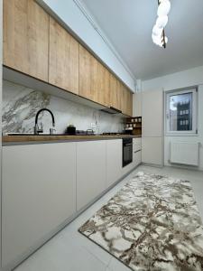 Η κουζίνα ή μικρή κουζίνα στο Apartament 1 Decembrie 1918