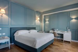 Cama ou camas em um quarto em Imperial Hotel Tramontano