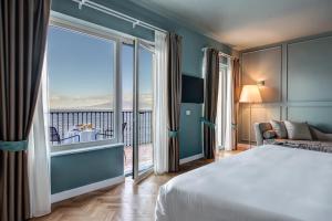 Cama ou camas em um quarto em Imperial Hotel Tramontano