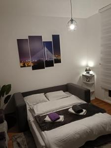 Postel nebo postele na pokoji v ubytování City011 studio