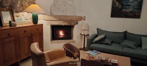 Ruang duduk di Maison au calme au bord de l'eau