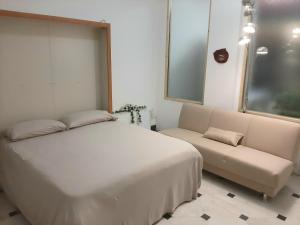 Postel nebo postele na pokoji v ubytování Laboratorio onirico