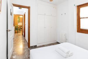 Posteľ alebo postele v izbe v ubytovaní Frente a la Alhambra