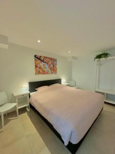 Una cama o camas en una habitación de Rodeberg Belle Vue
