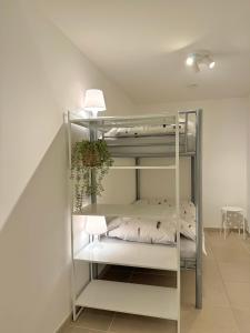 Una cama o camas en una habitación de Rodeberg Belle Vue