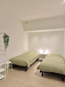 Una cama o camas en una habitación de Rodeberg Belle Vue