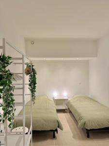 Una cama o camas en una habitación de Rodeberg Belle Vue