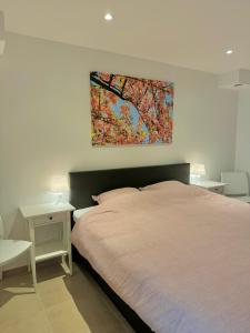 Una cama o camas en una habitación de Rodeberg Belle Vue