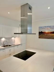 Una cocina o cocineta en Rodeberg Belle Vue