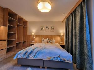 Posteľ alebo postele v izbe v ubytovaní St. Florian Appartements