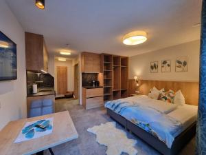 Posteľ alebo postele v izbe v ubytovaní St. Florian Appartements