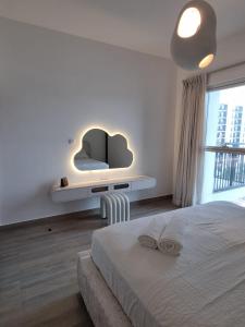 Ένα ή περισσότερα κρεβάτια σε δωμάτιο στο Water Edge, Yas Island