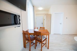TV a/nebo společenská místnost v ubytování New Cosy Apartment, close to TATRALANDIA and JASNA, parking