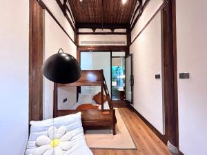 福州三坊七巷安民半舍文化酒店Fuzhou Sanfang Qixiang Anmin Banshe Cultural Hotel的休息区