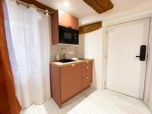 Kuchnia lub aneks kuchenny w obiekcie Suite Ruby