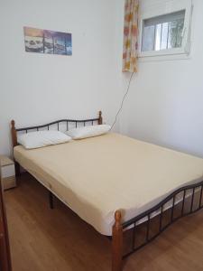 Postel nebo postele na pokoji v ubytování Apartment Michail 2