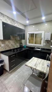 Kuchyň nebo kuchyňský kout v ubytování Une maison houmt souk djerba