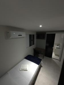 Postel nebo postele na pokoji v ubytování Hotel XV