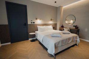 Katil atau katil-katil dalam bilik di Hotel Flaneur