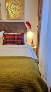 Postel nebo postele na pokoji v ubytování Charming studio apt in city center