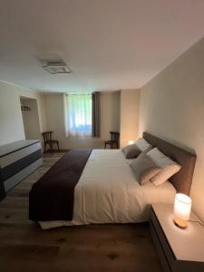 Postel nebo postele na pokoji v ubytování Maison Marcoz - Appartamenti vacanze
