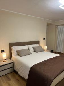 Postel nebo postele na pokoji v ubytování Maison Marcoz - Appartamenti vacanze