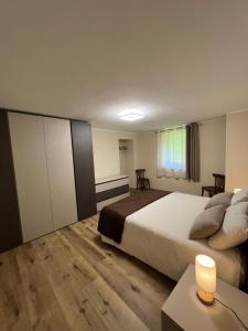 Postel nebo postele na pokoji v ubytování Maison Marcoz - Appartamenti vacanze