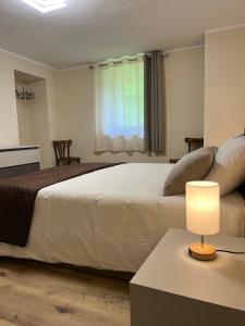 Postel nebo postele na pokoji v ubytování Maison Marcoz - Appartamenti vacanze