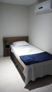 Postel nebo postele na pokoji v ubytování Hotel XV