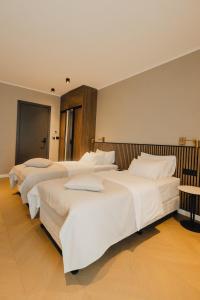 Katil atau katil-katil dalam bilik di Hotel Flaneur