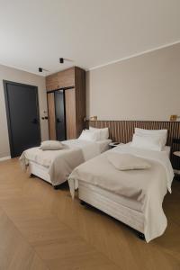 Katil atau katil-katil dalam bilik di Hotel Flaneur