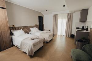 Katil atau katil-katil dalam bilik di Hotel Flaneur