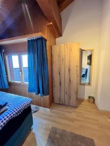 Voodi või voodid majutusasutuse Chalet Bergdoktor toas