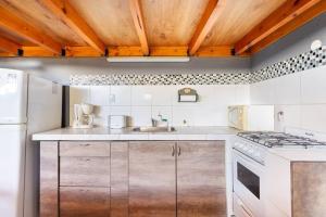 Kuchyňa alebo kuchynka v ubytovaní Casa Montaña - MELIPAL LOFT + 39 fotografií