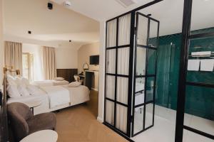 Katil atau katil-katil dalam bilik di Hotel Flaneur