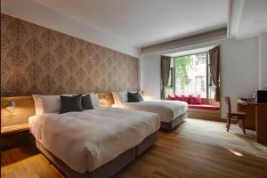 Кровать или кровати в номере EG Hostel