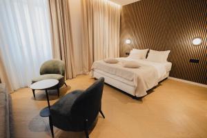 Katil atau katil-katil dalam bilik di Hotel Flaneur