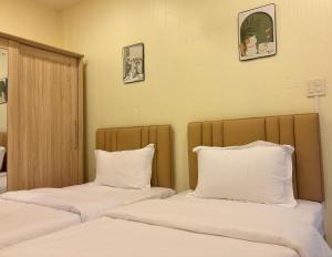 Apamet Hotel Sukhumvit 55客房内的一张或多张床位