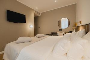 Katil atau katil-katil dalam bilik di Hotel Flaneur