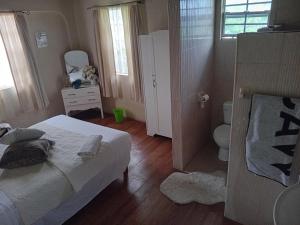 Postel nebo postele na pokoji v ubytování Chandler Homestay