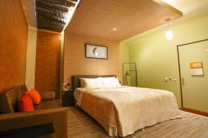 Postel nebo postele na pokoji v ubytování Moonlight Motel